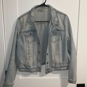 Ripped denim jacket